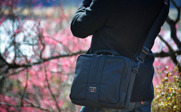 A person holding a Pilot.